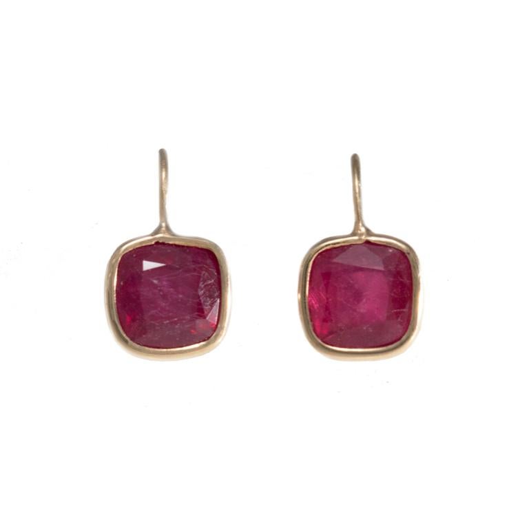 18 Carat Yellow Gold Ruby Earrings.

Esther Eyre has been designing and making precious jewellery for over twenty years. She trained at Kingston and Middlesex gaining a BA in jewellery design in 1982. Esther worked briefly in Mappin & Webb before