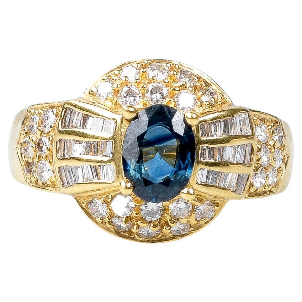 18 carat yellow gold sapphire and diamonds ring For Sale