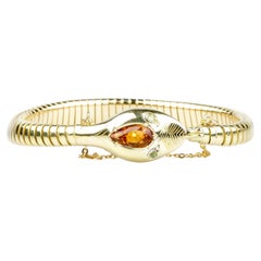18 carat yellow gold snake bracelet - 0.28 carat citrine and 0.04 carat peridots