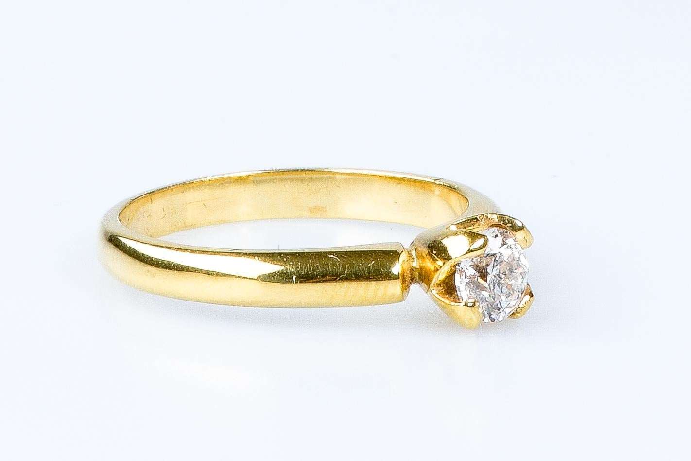 18 carat yellow gold solitaire round brillant cut diamond ring In Excellent Condition For Sale In Monte-Carlo, MC