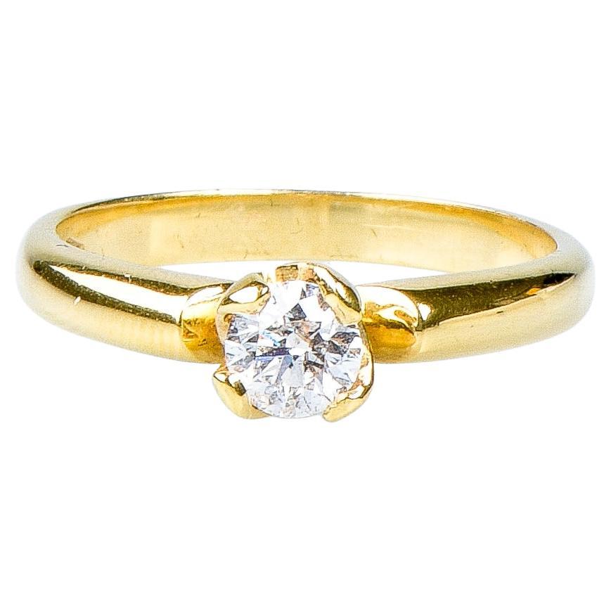 18 carat yellow gold solitaire round brillant cut diamond ring For Sale
