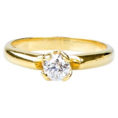 Bague solitaire en or jaune 18 carats avec diamants ronds brillants