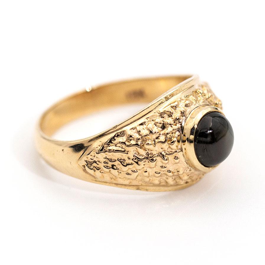 Forged in 18 carat yellow gold is this dapper vintage uniquely designed signet mens ring featuring a 6-ray star dark brown sapphire in the centre. We have named this handsome ring The Murray Ring.  

The Murray Ring
Ring Size   10 1/2 (US and
