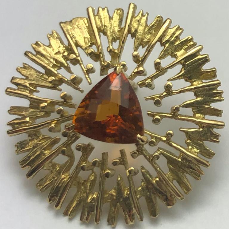 18 Carat Yellow Gold Trillion Citrine Earrings. 

Esther Eyre has been designing and making precious jewellery for over twenty years. She trained at Kingston and Middlesex gaining a BA in jewellery design in 1982. Esther worked briefly in Mappin &