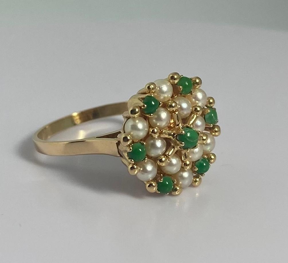 This is for sure a one of kind gorgeous ring from 1950S. So happy to present to you this 18 carat yellow golden ring. Besides the very good condition of this attractive ring, the color of the nephrites, jade itself and the combination with the