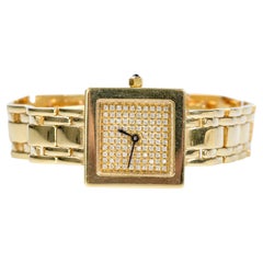 18-carats yellow gold watch with soft mesh and 100 round cut diamonds of 1 carat