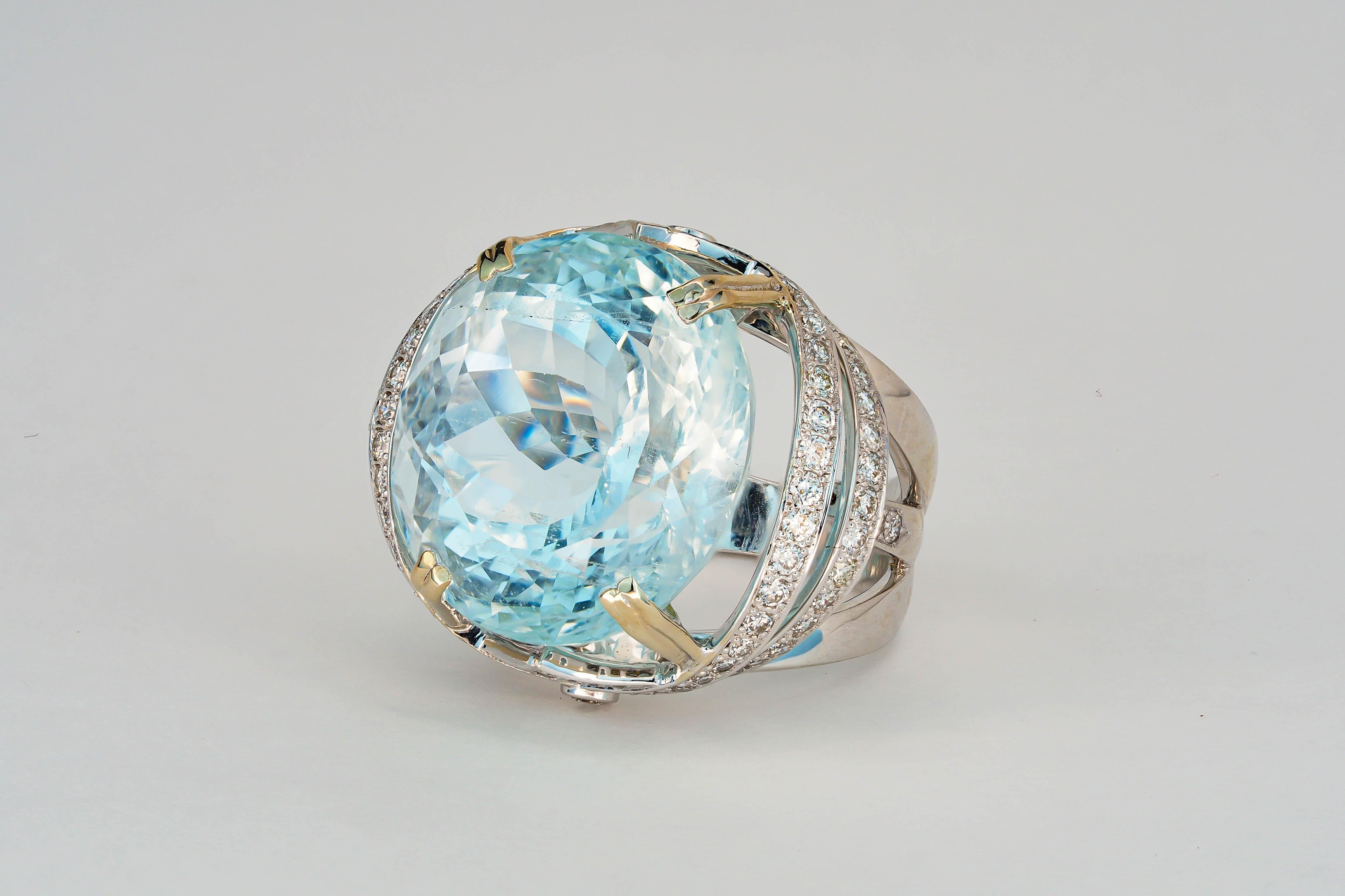 18 Ct Gold Ring with 25 Ct aquamarine and Diamonds 11