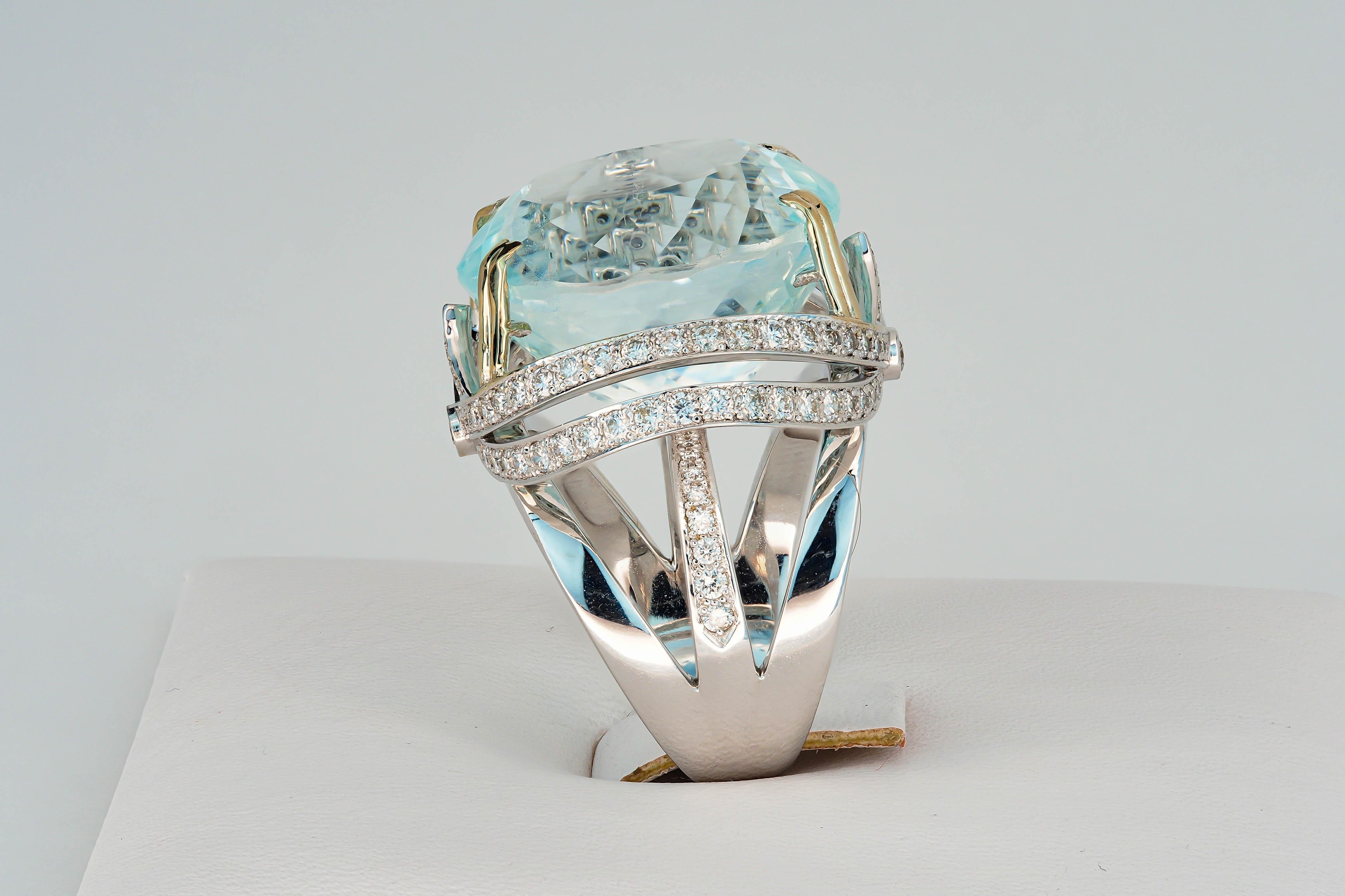 18 Ct Gold Ring with 25 Ct aquamarine and Diamonds 12