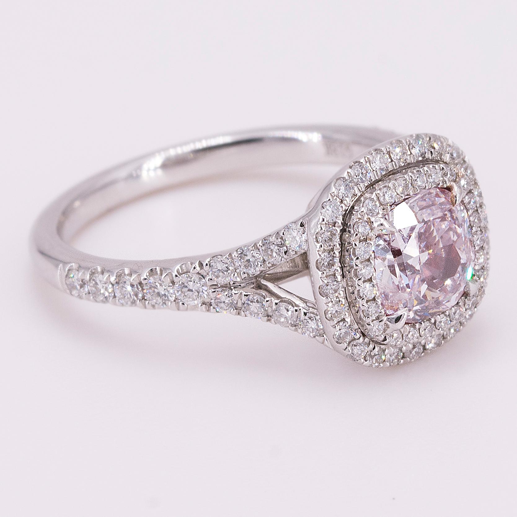 18k Ring with GIA 1.01 carat light pink cushion cut diamond and 76 round brilliant diamonds weighing 0.53 caarats. 4.48g