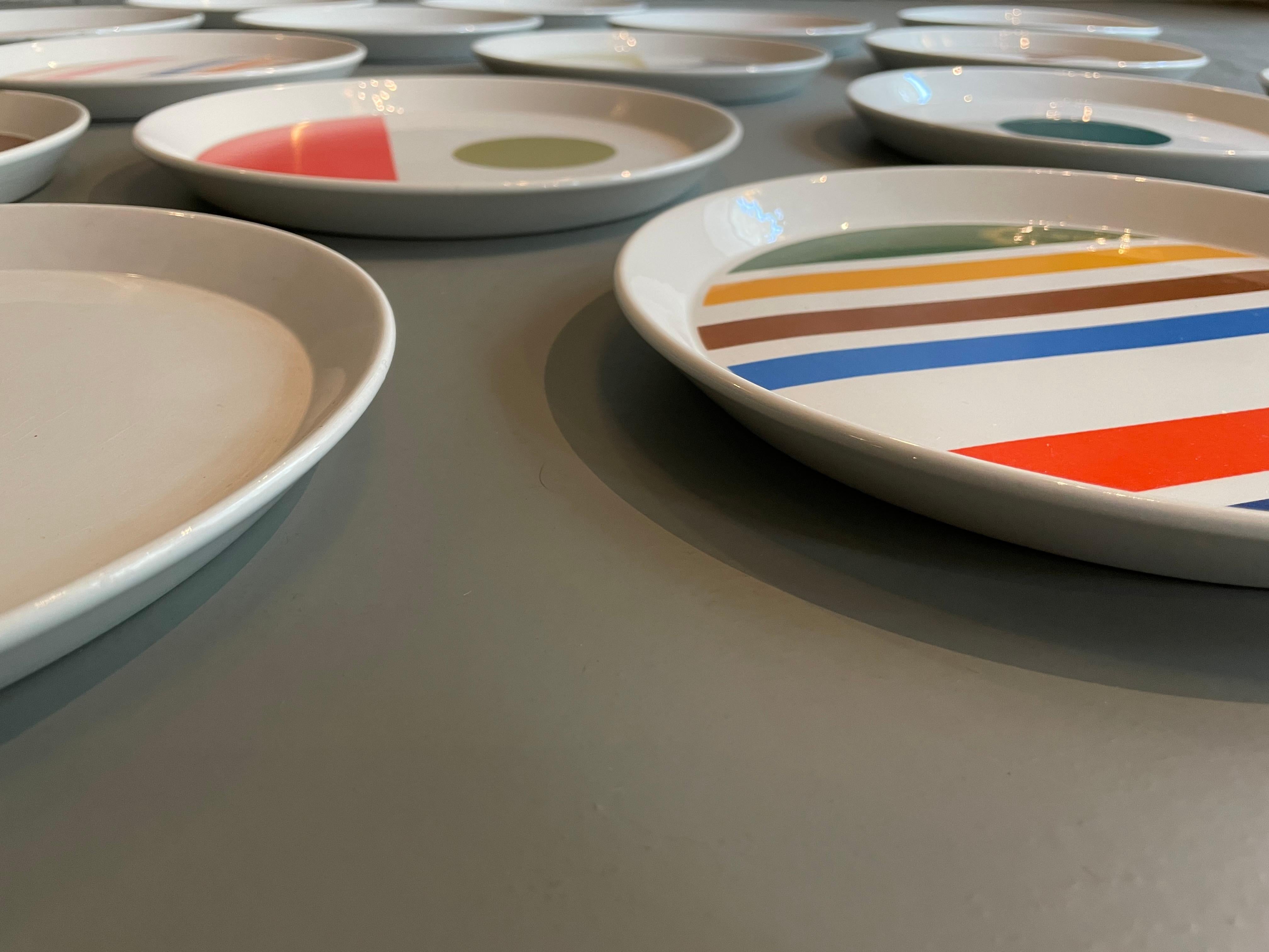 Silk-screened and glazed ceramic plates designed by Gio Ponti as part of the 