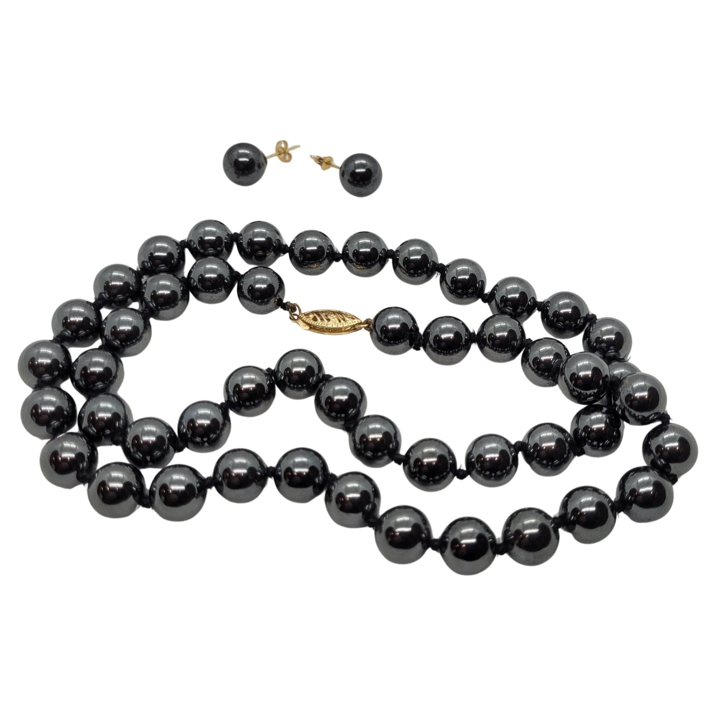 18 Inch 8.3mm Hematite Beads Knotted, 14kt Yellow Gold Clasp 14kt Friction Studs