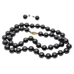 18 Inch 8.3mm Hematite Beads Knotted, 14kt Yellow Gold Clasp 14kt Friction Studs