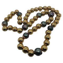 18 Inch Black Pearl & 14K Gold Bead Necklace