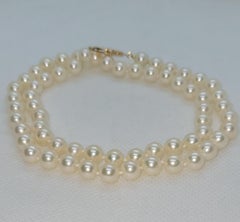 18 Inch Cultured White Pearl Strand, 6.5mm Pearls, 14kt Yellow Gold Clasp, Knot
