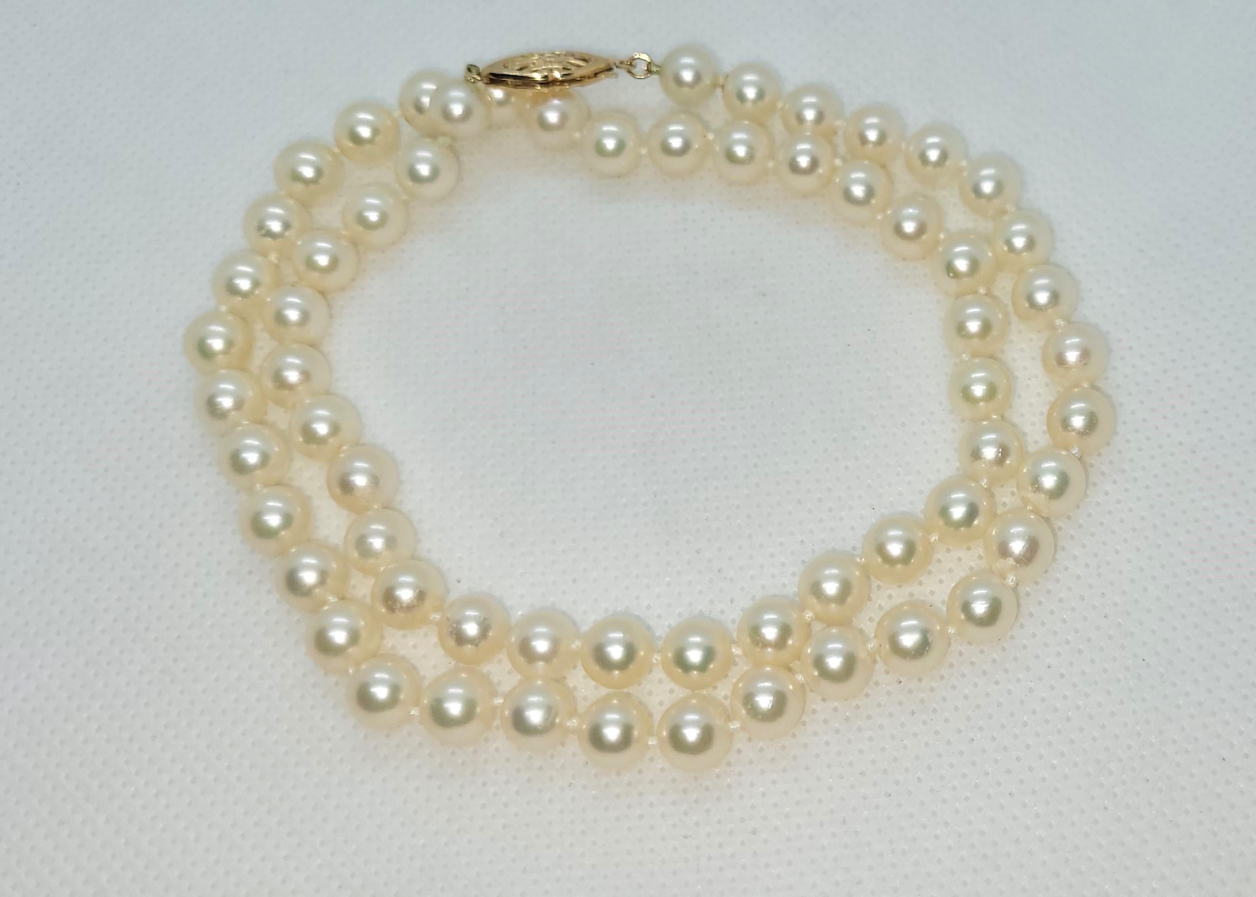 Round Cut 18 Inch Cultured White Pearl Strand, 6.5mm Pearls, 14kt Yellow Gold Clasp, Knot For Sale