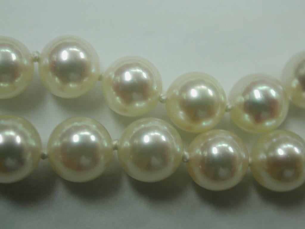Women's Double Row Cultured Pearl Necklace with 9 Carat Gold Pierced Bow Snap, 1970
