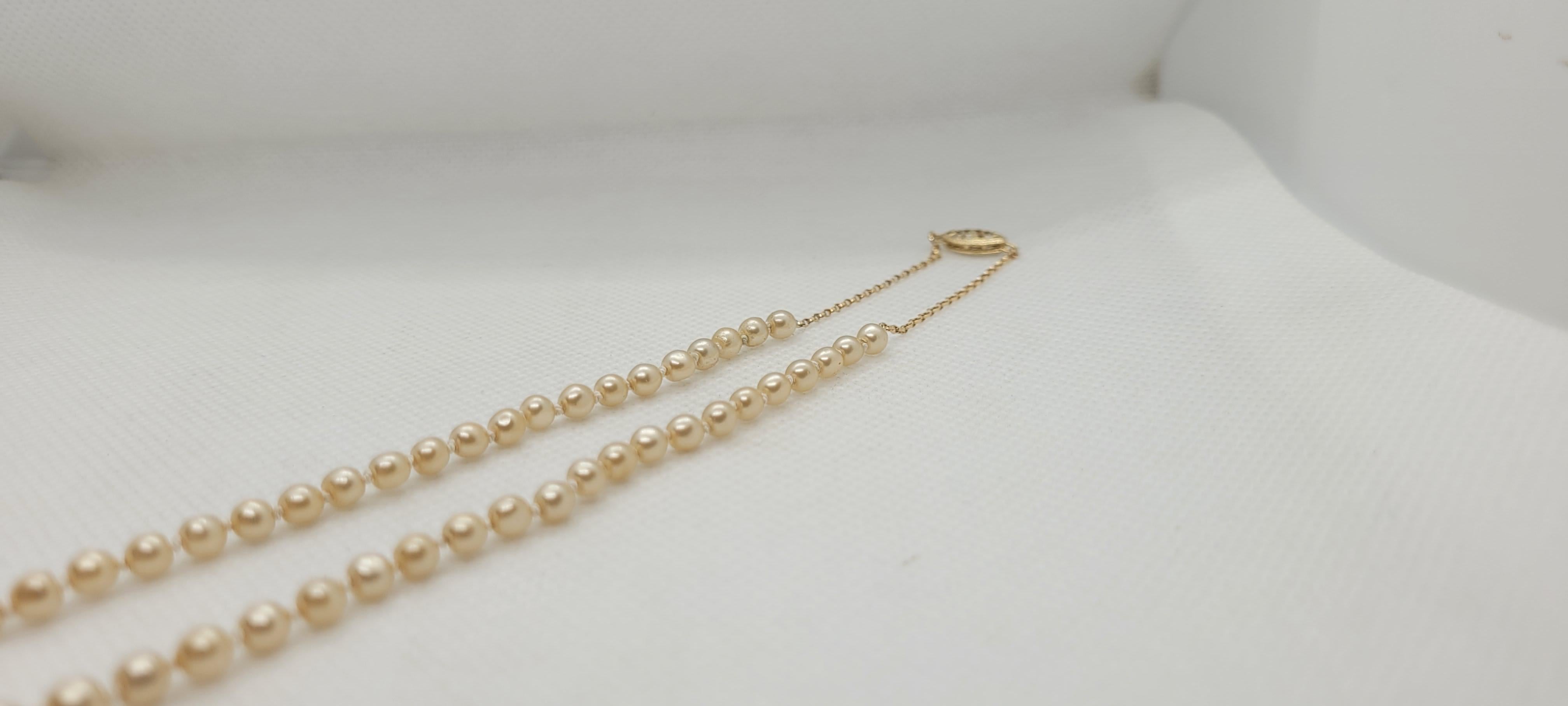 18 Zoll abgestufte Zuchtperlenkette, Champagner, 14kt Gliederverschluss, 9,3 mm im Angebot 1