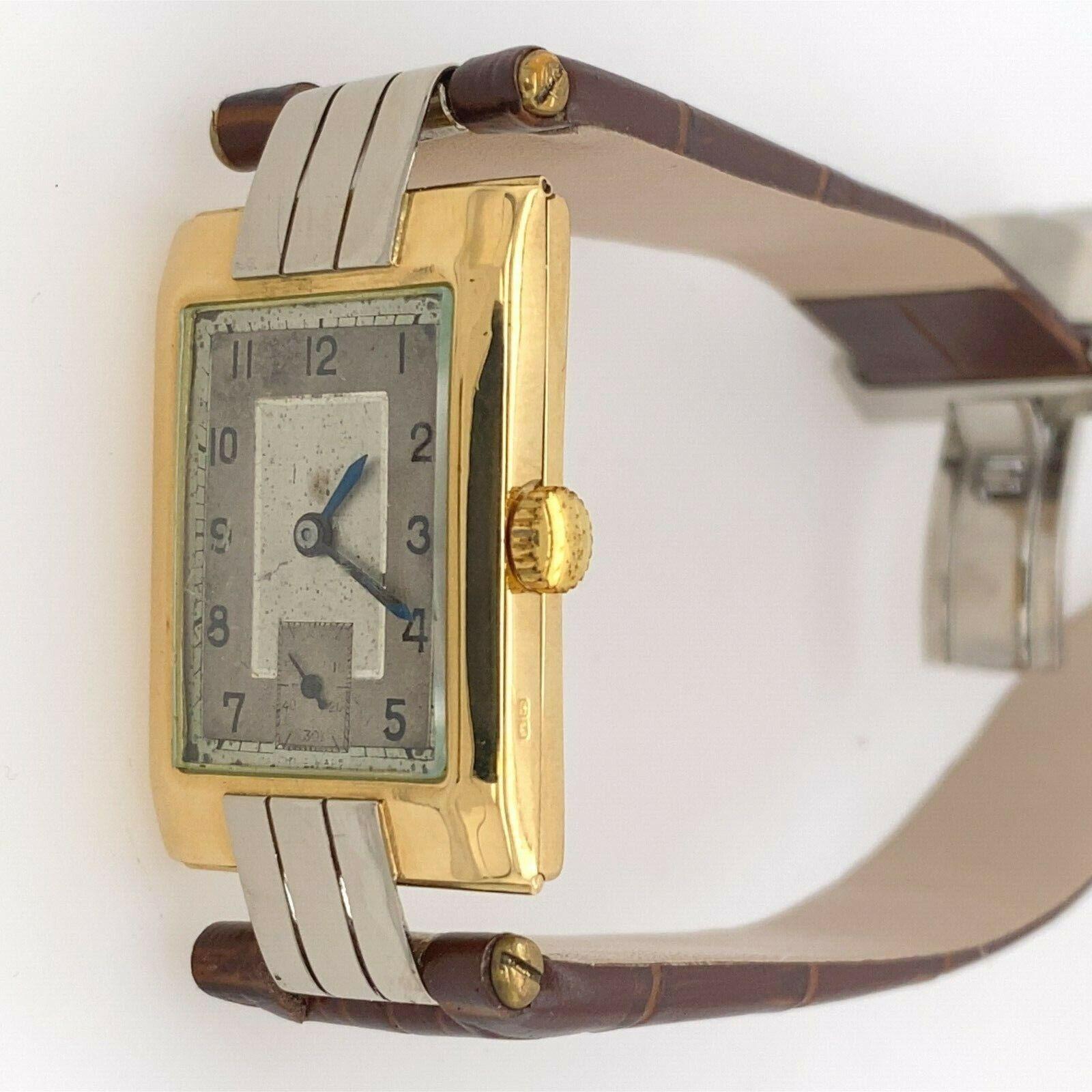 18ct Yellow & White Gold, 18 Jewel, Tank Watch – Swiss Made

Additional Information:
Case Size: 149mm
Total Weight: 39g
18ct Gold Hallmark
Made in Switzerland
In perfect working condition
SMS3255