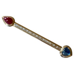 18 K Gold Bar Pin Brooch with Baguette Diamonds and Sapphire and Ruby Cabochon