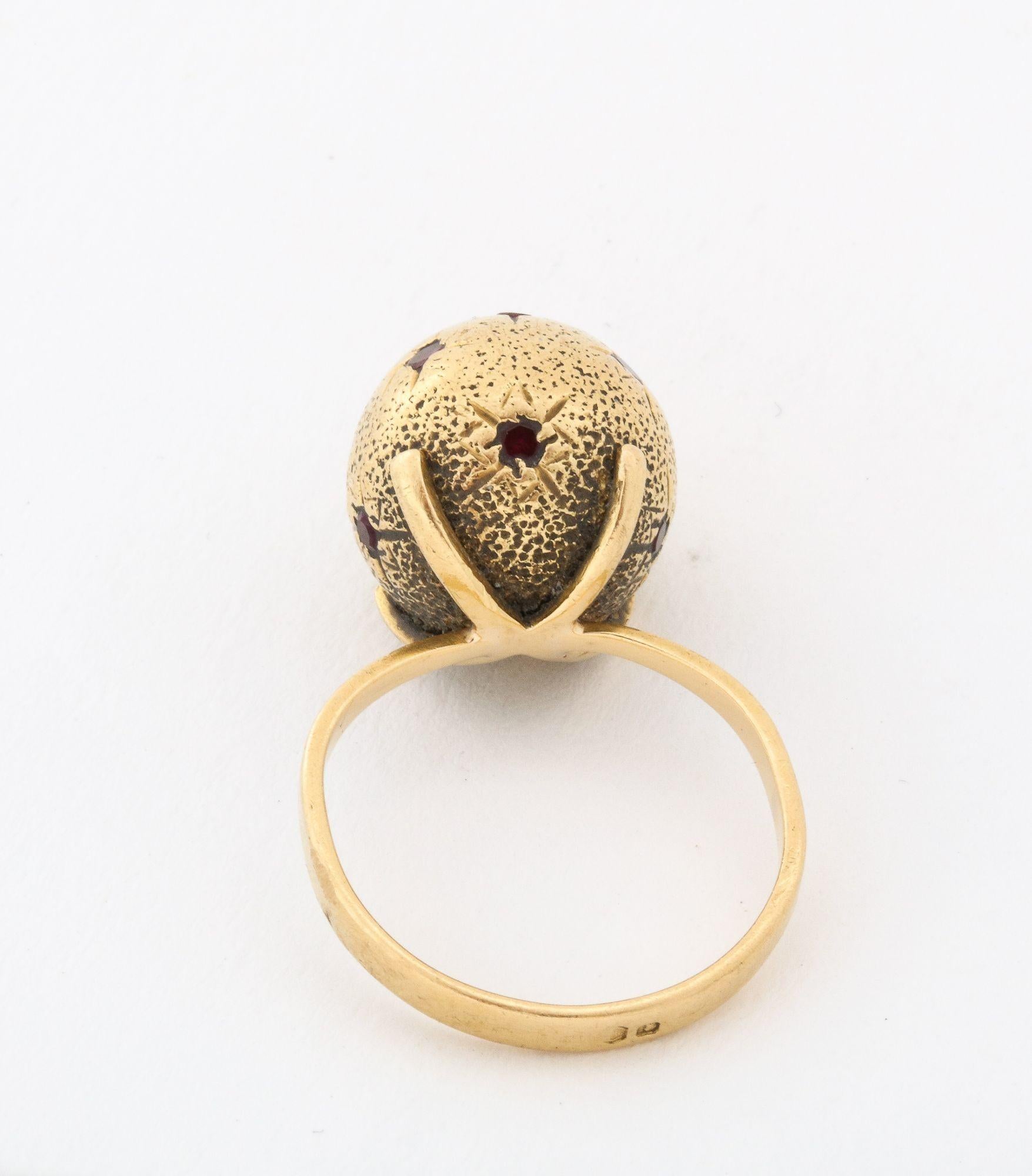 Brilliant Cut 18 k Gold Sphere / Globe Ring with Star-set Rubies For Sale