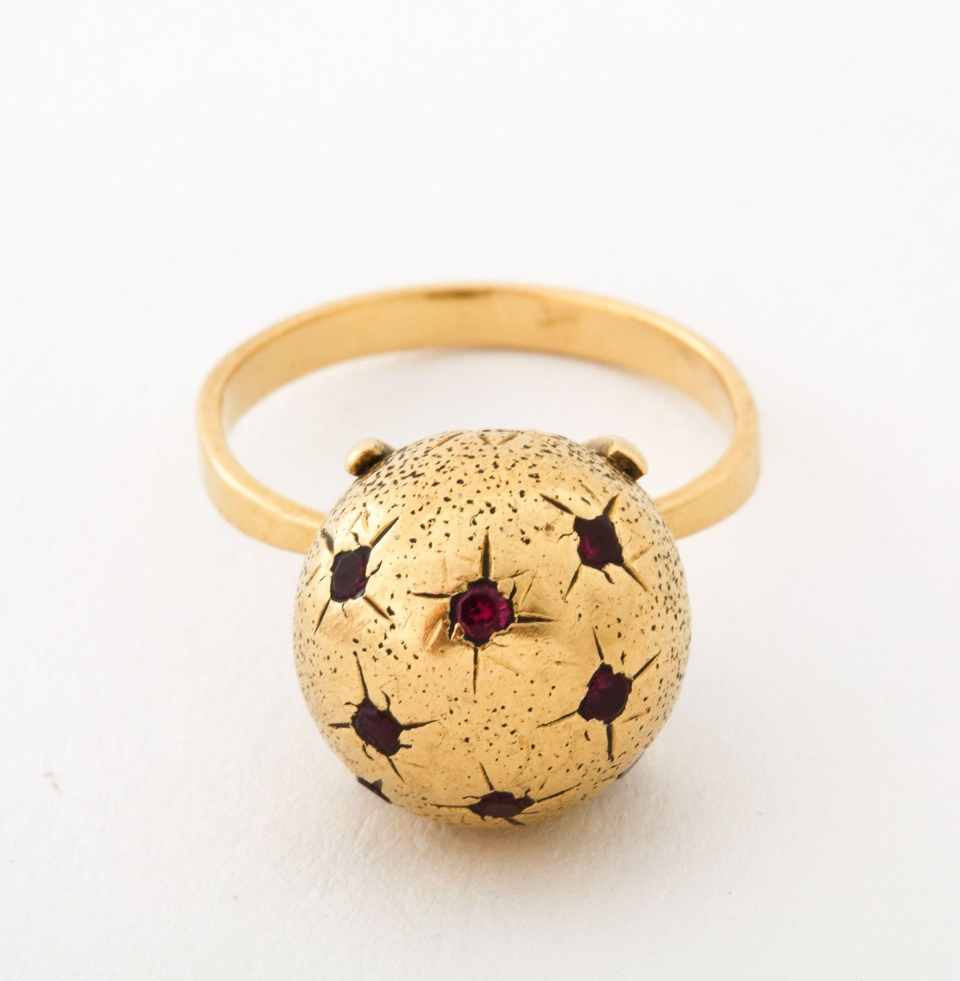 Women's 18 k Gold Sphere / Globe Ring with Star-set Rubies For Sale