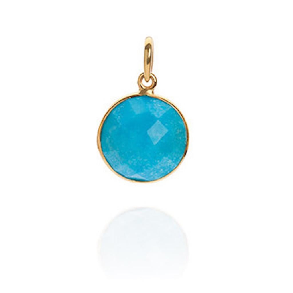 A rose cut turquoise 18-karat gold throat chakra pendant necklace, an easy-to-wear everyday simple pendant necklace from Elizabeth Raine's Chakra Gemstone Collection, modelled by Dua Lipa. 

 Gemstone : rose cut turquoise set in a 18-karat gold