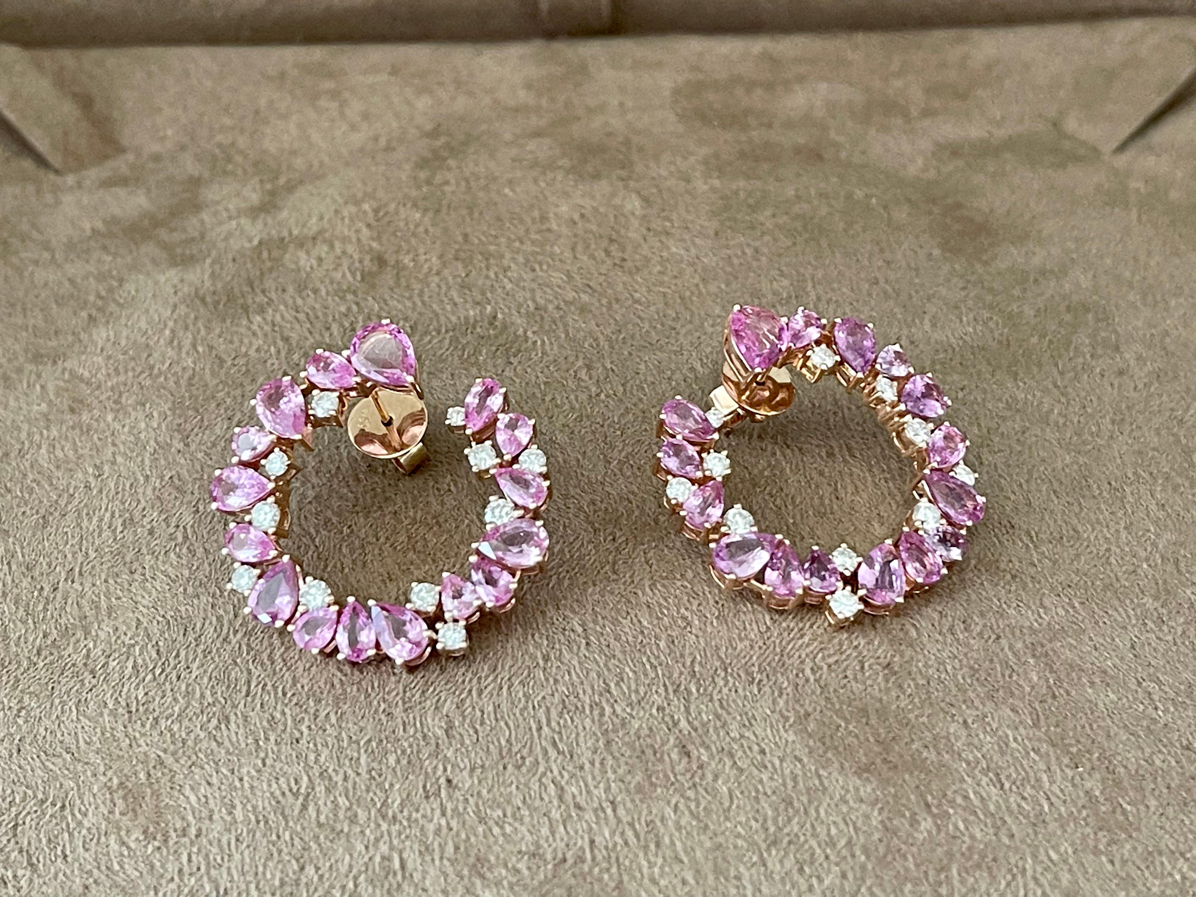Are you looking for some unique diamond and pink Sapphire hoop earrings that are different and have style? Look no further than these glorious diamond pink Sapphire hoops that sit so perfectly on the ears. Hoops are a must in everyone's wardrobe but
