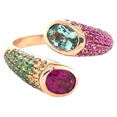 Anello in oro rosa 18k con tormalina e granato verde