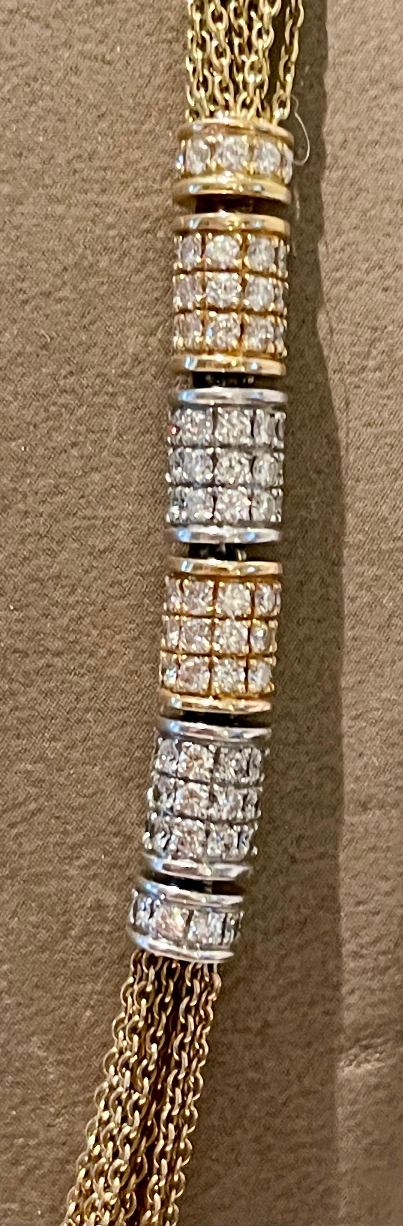 Diamond Sautoir Necklace, signed Paul Binder, Zurich
The Sautoir created by Paul Binder (long necklace) consists of 14 fine anchor chains, set 66 brilliant cut Diamonds weighing approximately 3.24 ct, F/G VVS. The clasp is in 18 K white and rose