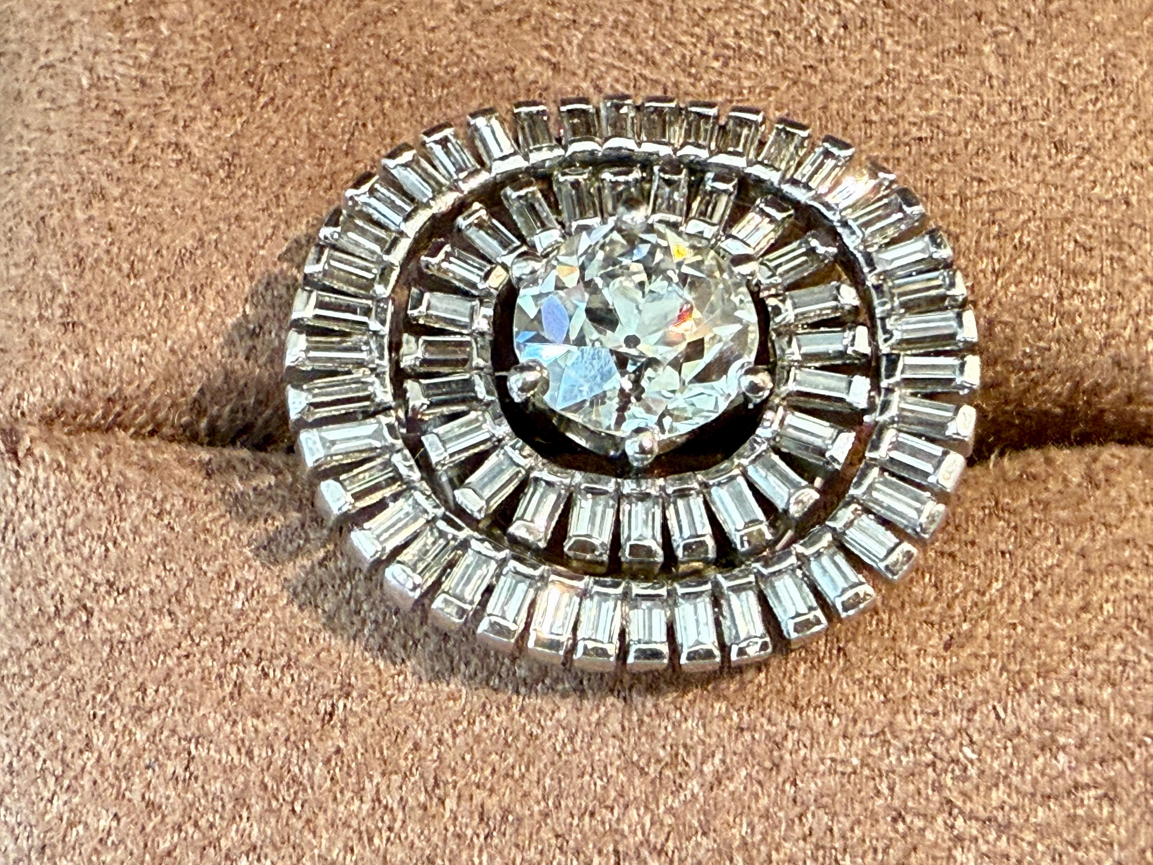 A timeless and elegant 18 K white Gold Vintage Ring featuring a round old mine cut Diamond weighing approximately 1.85 ct, I color, si clarity. The Ring, who was made by the well-known jeweler Burch & Korrodi, who had his raetail shop on