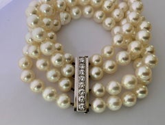 18 Karat White Cultured Pearl and Diamond 4-Row Bracelet by Meister Zurich