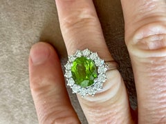 18 K white God Entourage Ring Peridot and Diamonds