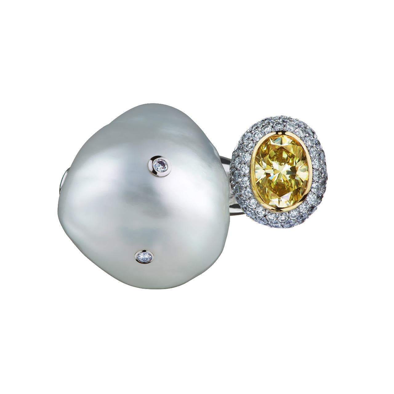 - 1 Oval Fancy Yellow Diamond – 1.03 ct, FY/VS1
- 263 Round Diamonds – 1.80 ct, F-G/VVS2-VS1
- 20.40 mm White South Sea Baroque pearl
- 18K White Gold 
- Weight: 17.24 g
- Size: 17.1 mm
This fabulous ring from the Bionics collection of Jewelry