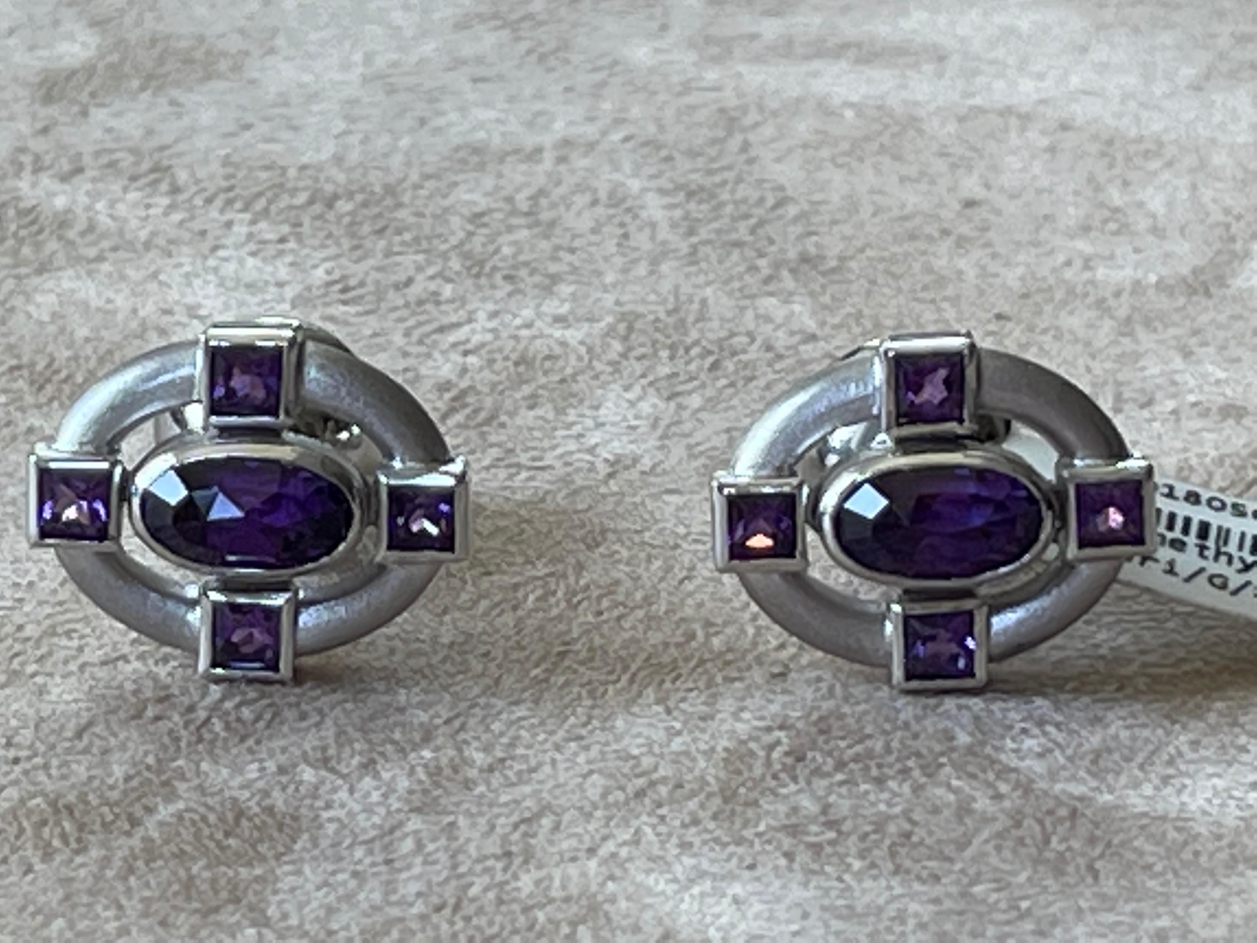 A pair of very attractive 1and extravagant 18 K white Gold cufflinks featuring 10 Amethysts and 18 brilliant cut Diamonds weighing 0.20 ct.  The texture of the surface is delicately brushed and creates an understated look. The back part of the