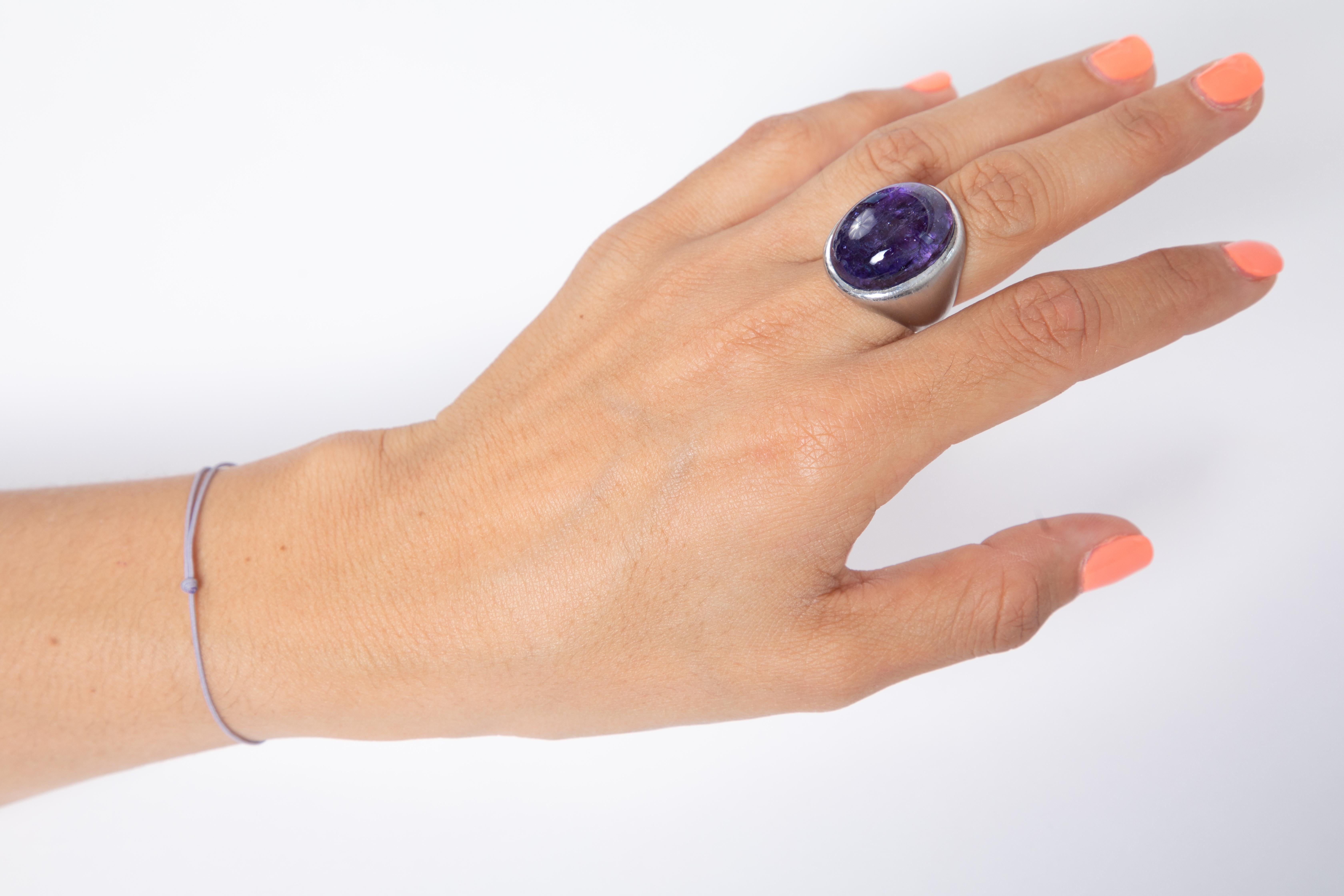 Contemporary 18 K White Gold Brushed Ring with a Gorgeous Tanzanite Cabochon 36.97 Ct For Sale