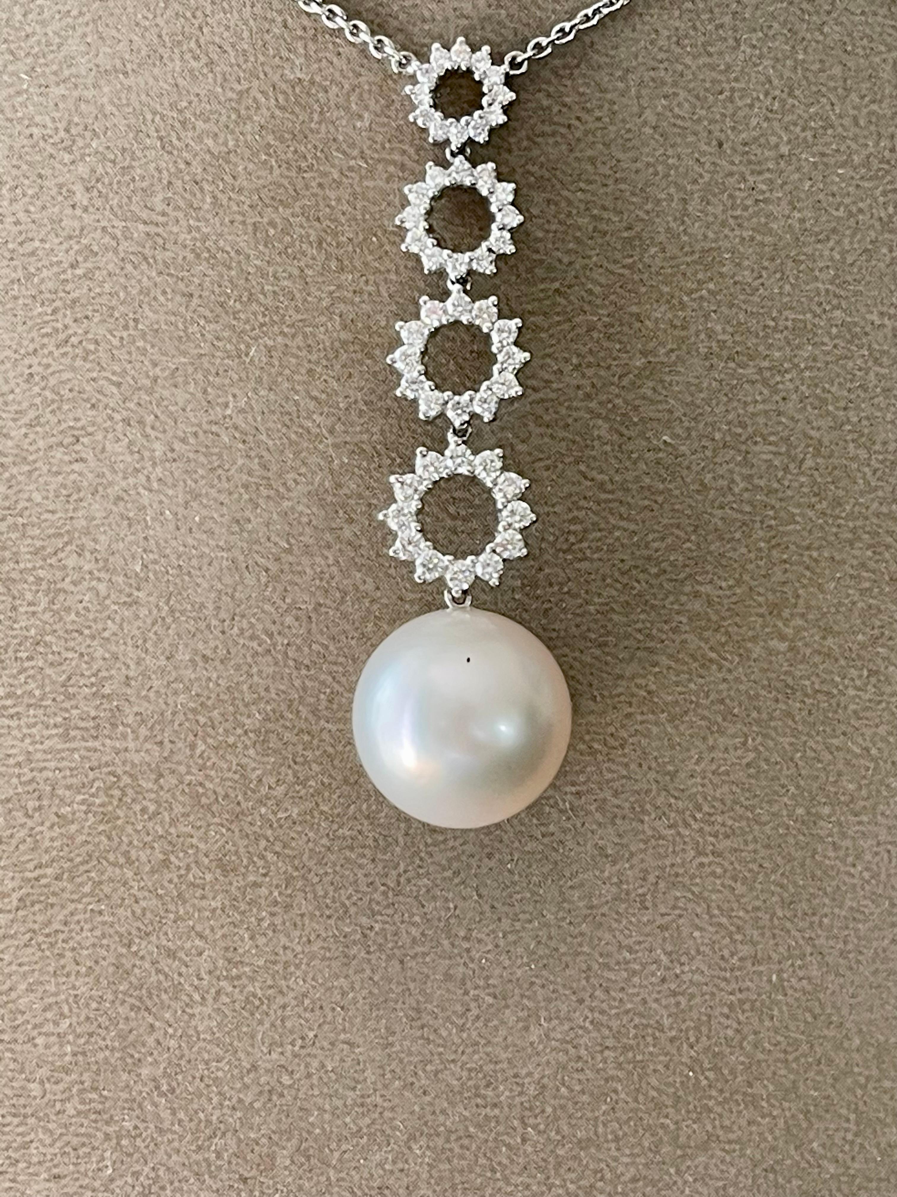 Timeless and attractive 18 K white Gold chain featuring a round white South Sea Pearl (14.4mm) and brilliant cut Diamonds with a total weight of 0.82ct. The total length of the white gold chain is 41 cm and the necklace can be worn with either