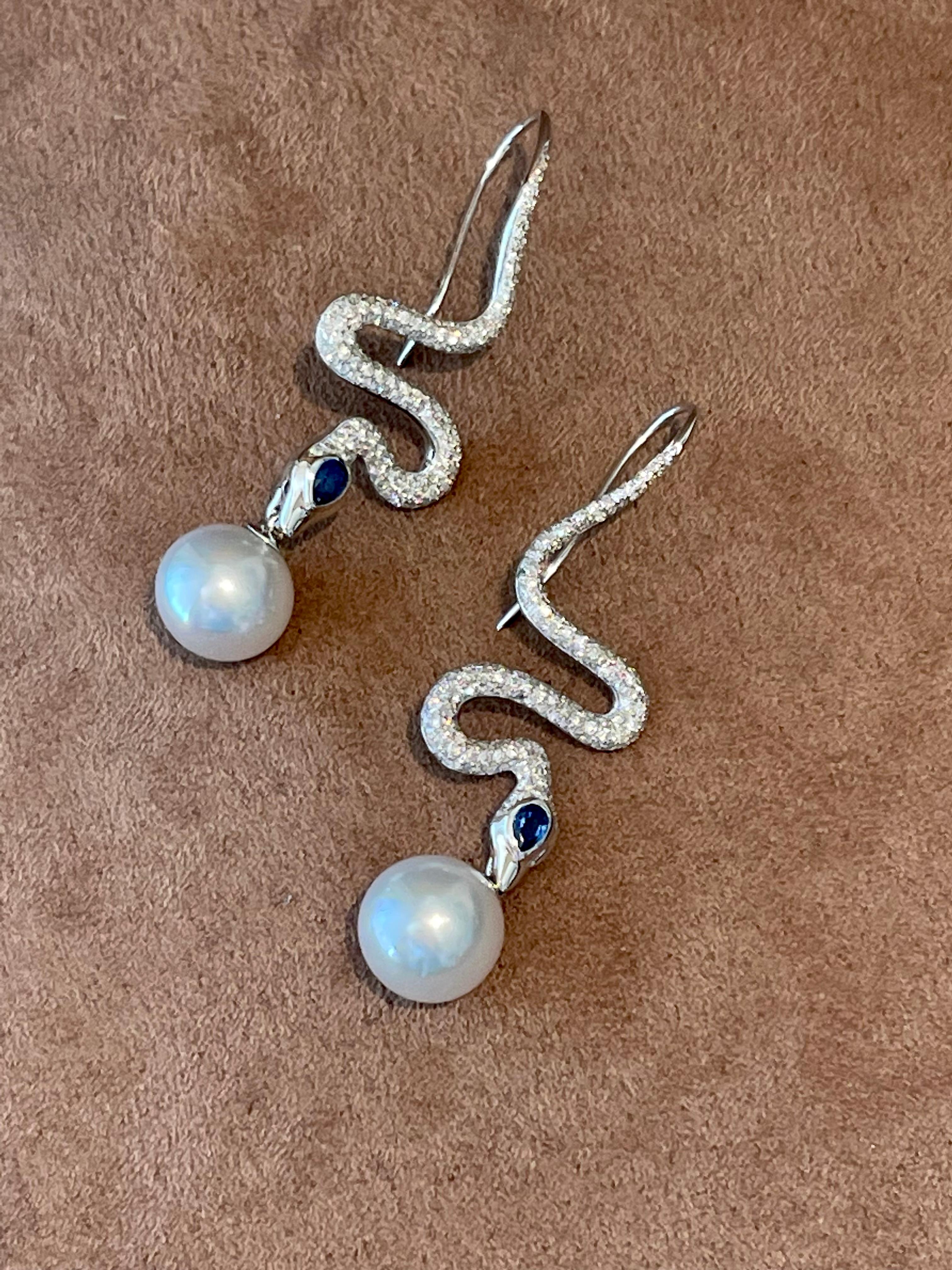 Contemporary 18K White Gold Diamond Sapphire South Sea Pearl Snake Earings For Sale
