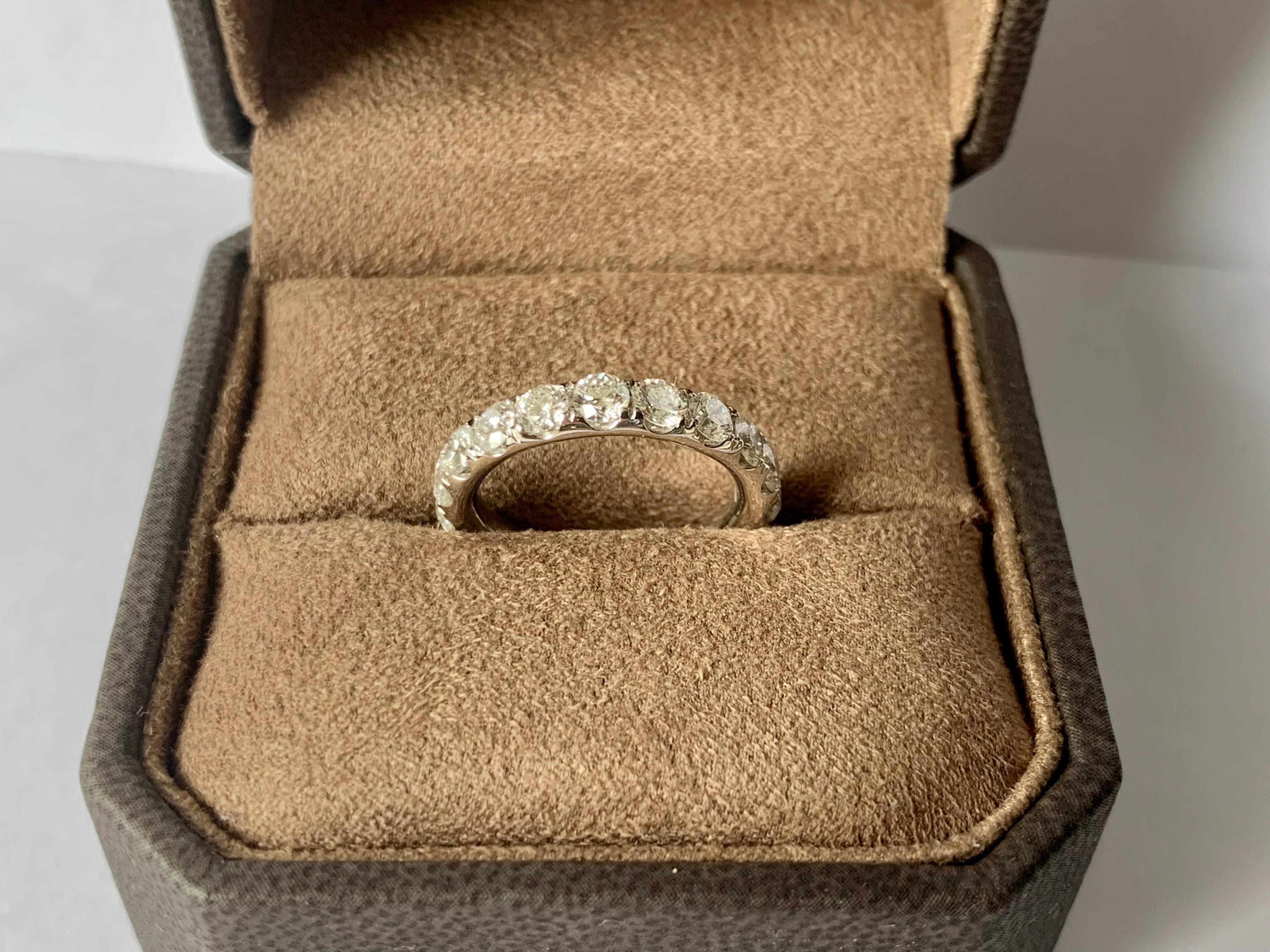 Round Cut 18 Karat White Gold Eternity Diamond Ring 3.20 Carat For Sale