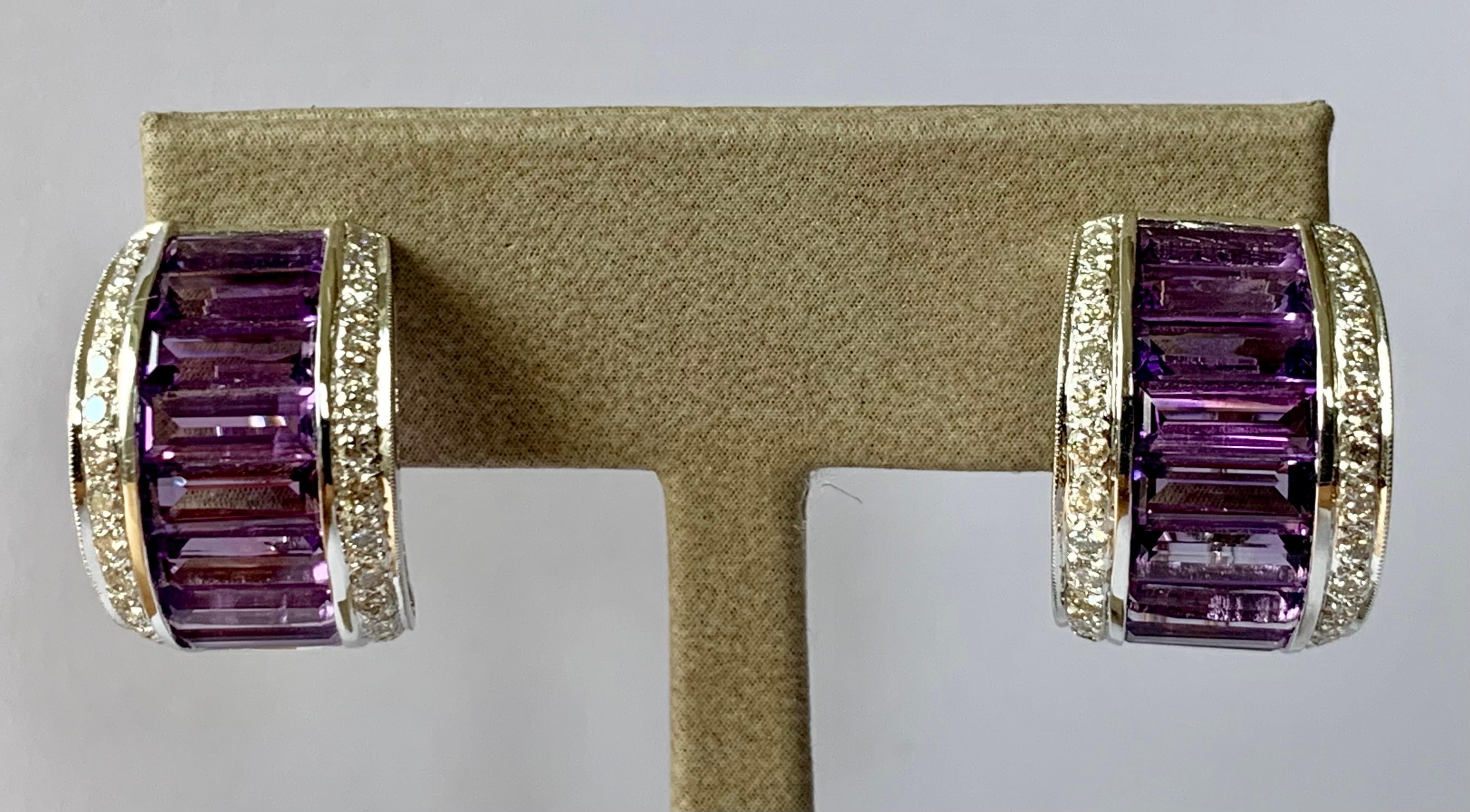 A pair of Diamond and Amethyst half hoop earrings, with 60 pavé set round brilliant-cut Diamonds weighing 1.08 ct  and 18 channel set baguette-cut Amethysts with a total weight of 7.67 ct.  Mounted in 18 K white Gold.
Omega clip post earrings. 