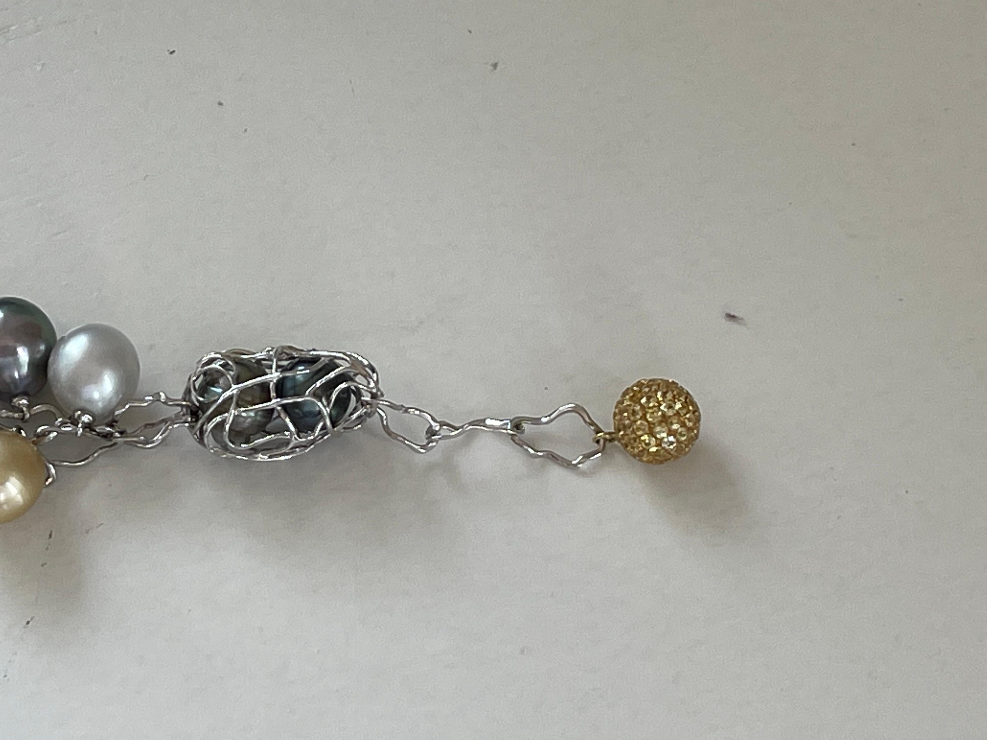 Women's 18 K White Gold Interlocking Charm Wire Link Bracelet with Pearls Fancy Sapphire For Sale