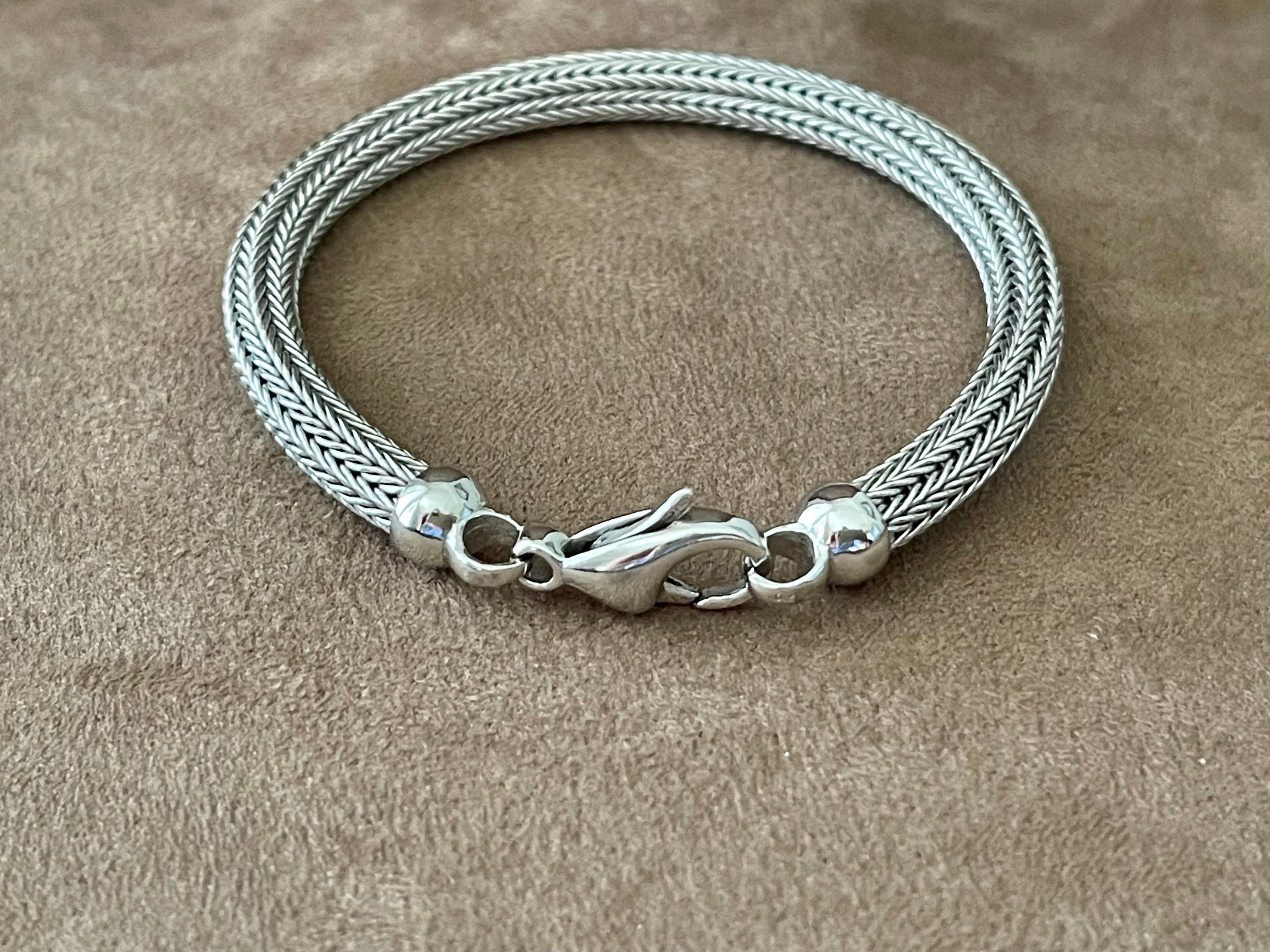 Timeless 18 K white Gold knitted bracelet that is the perfect choice for everyday wear! 0.57 mm diameter. 27.97 grams. Length: 19 cm.
Masterfully handcrafted piece! Authenticity and money back is guaranteed.
For any enquires, please contact the