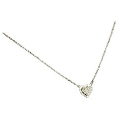 18 k white gold necklace with central heart with brilliant cut diamonds ct.0.65