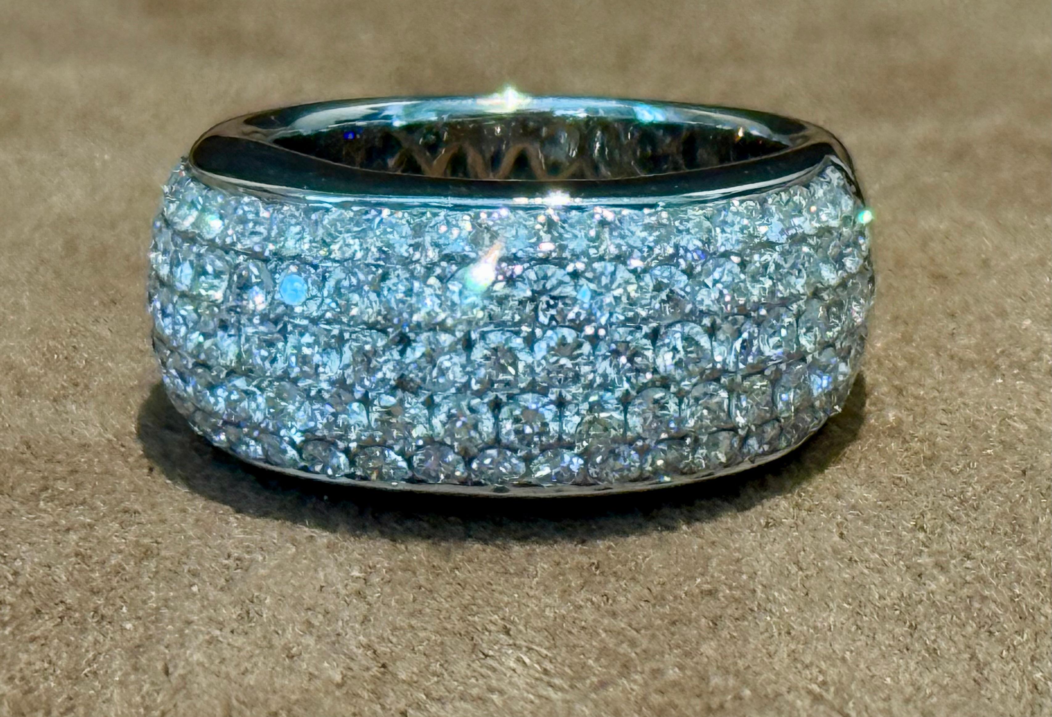 This chic and fabulous domed Pavé Ring is crafted in 18 K white gold and set with 99 round brilliant cut F-G VVS2-VS1 diamonds weighing 2.12 carats. 
Measurement: 1.40 cm inwidth. 
The ring is size 14/54 (american Ring size 7) but can easily be