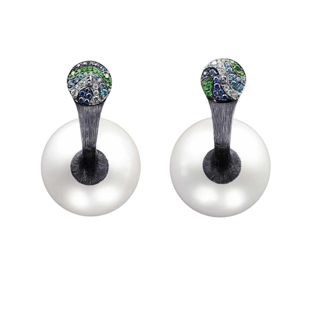 - 12 Round Diamonds – 0.06 ct, D-F/VVS
- 17 Round Blue Diamonds – 0.10 ct
- 18 Round Sapphires– 0.12 ct
- 15 Round Tsavorites– 0.08 ct
- 2 White South Sea pearls - 19.8 mm
- 18K White Gold 
- Weight: 27.01 g
Two perfectly matched lustrous White