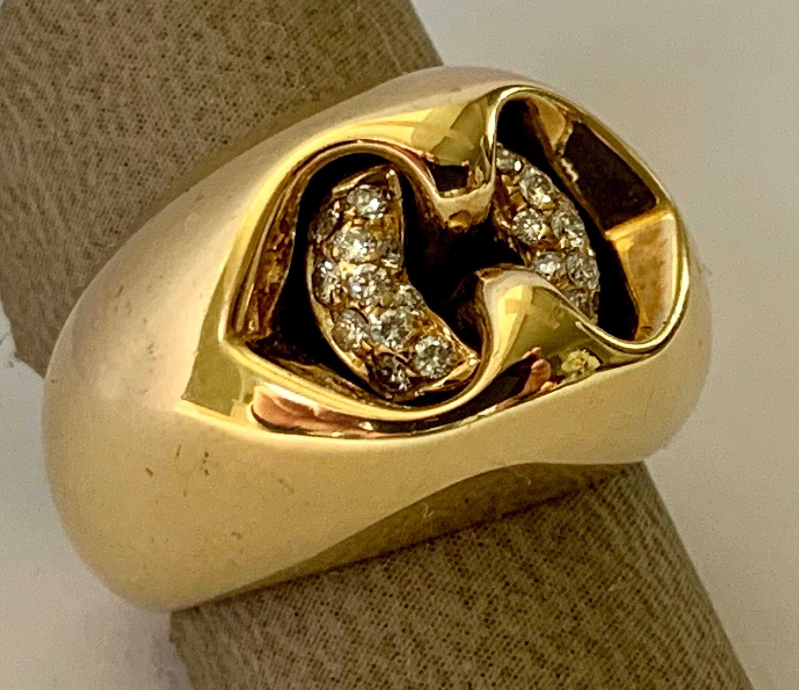18k yellow Gold Diamond Ring by Bulgari.  Set with round brilliant cut diamonds VS1 clarity, G color total weight approximately 0.25 ct. Stamped Hallmarks: Bvlgari 750 Made In Italy. 
The ring is currently size european size 51/11. Approximate ring