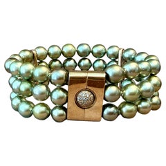 18 K yellow Gold 3 row Pistachio green Tahitinan Pearl Diamond Bracelet