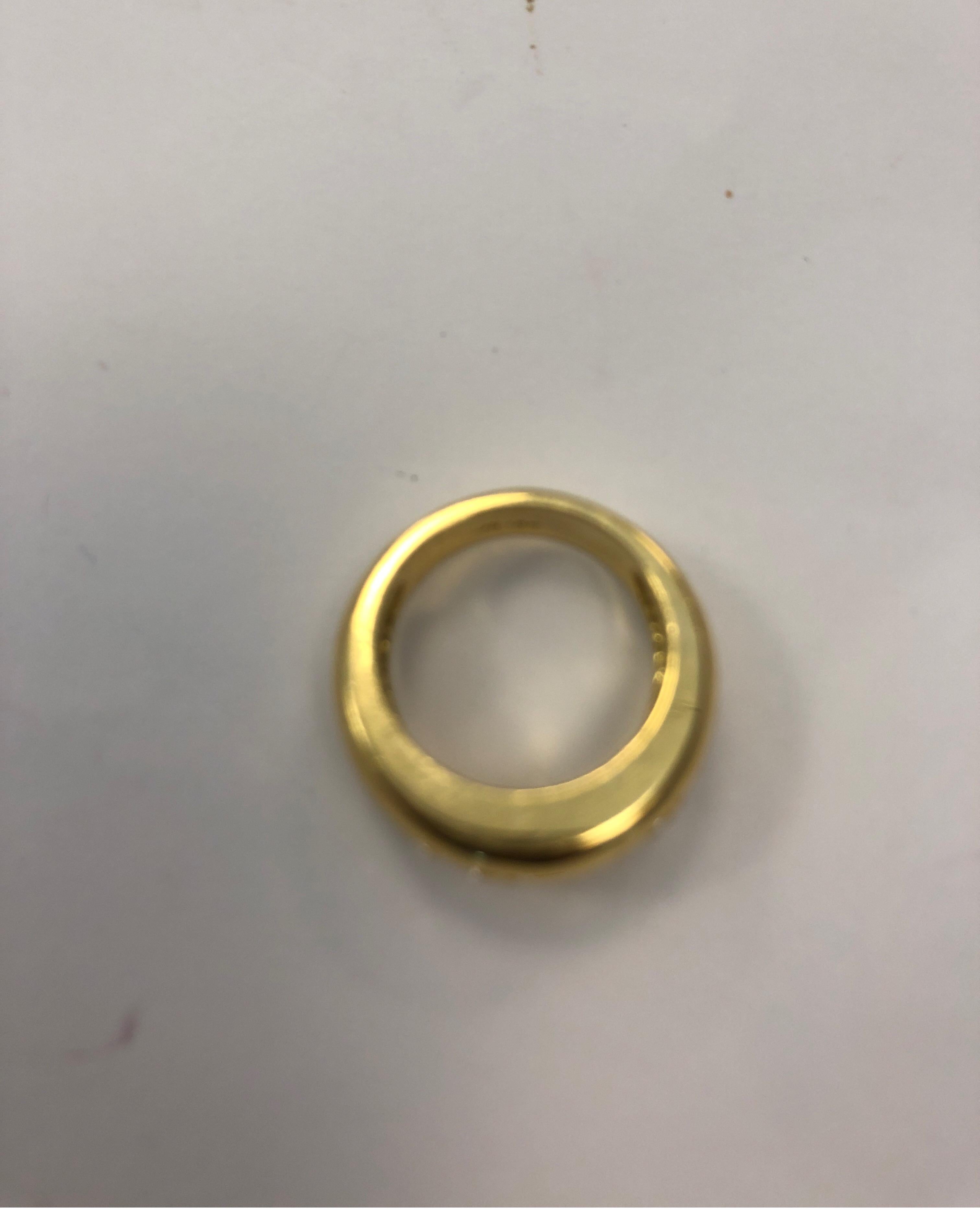 18 K yellow gold band ring channel set with 4 round diamonds, G color, VS clarity
Last retail $ 7250
Finger size 5.75, may be sized