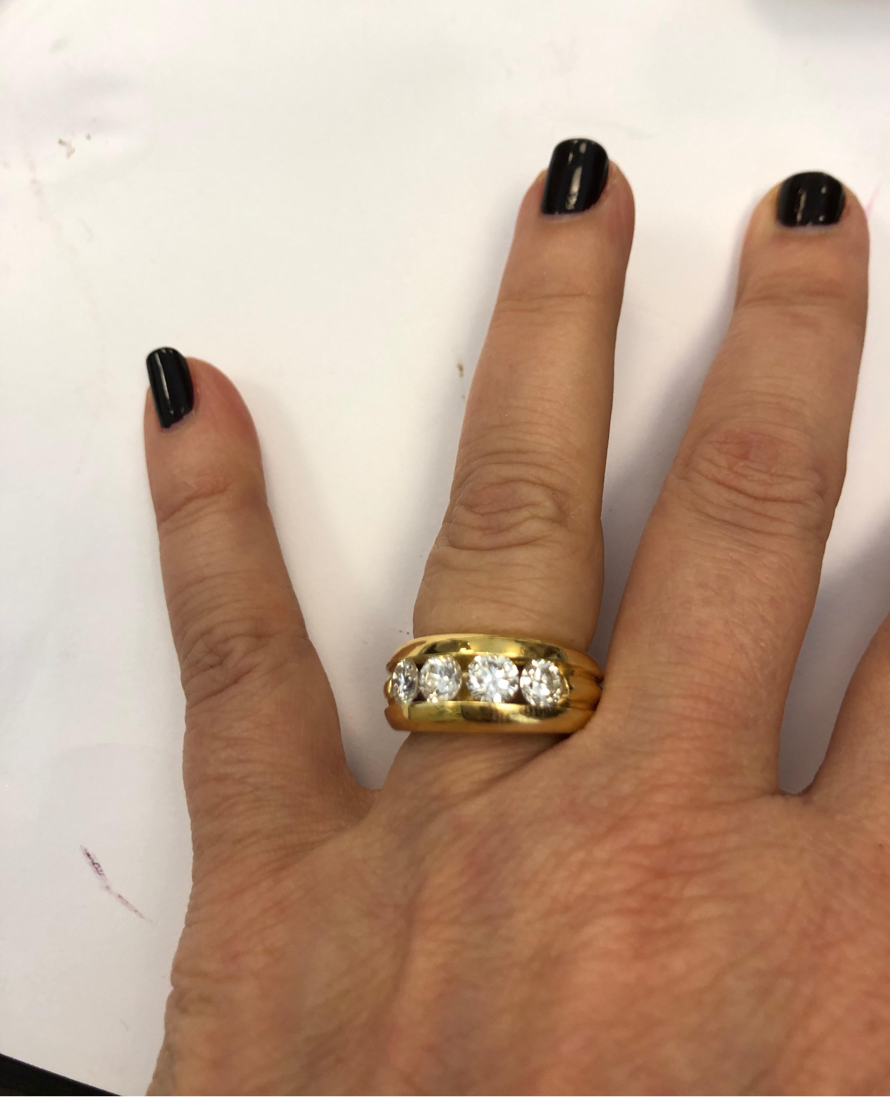 18 Karat Yellow Gold Band Ring Channel Set with Four Round Diamonds In New Condition For Sale In Chicago, IL