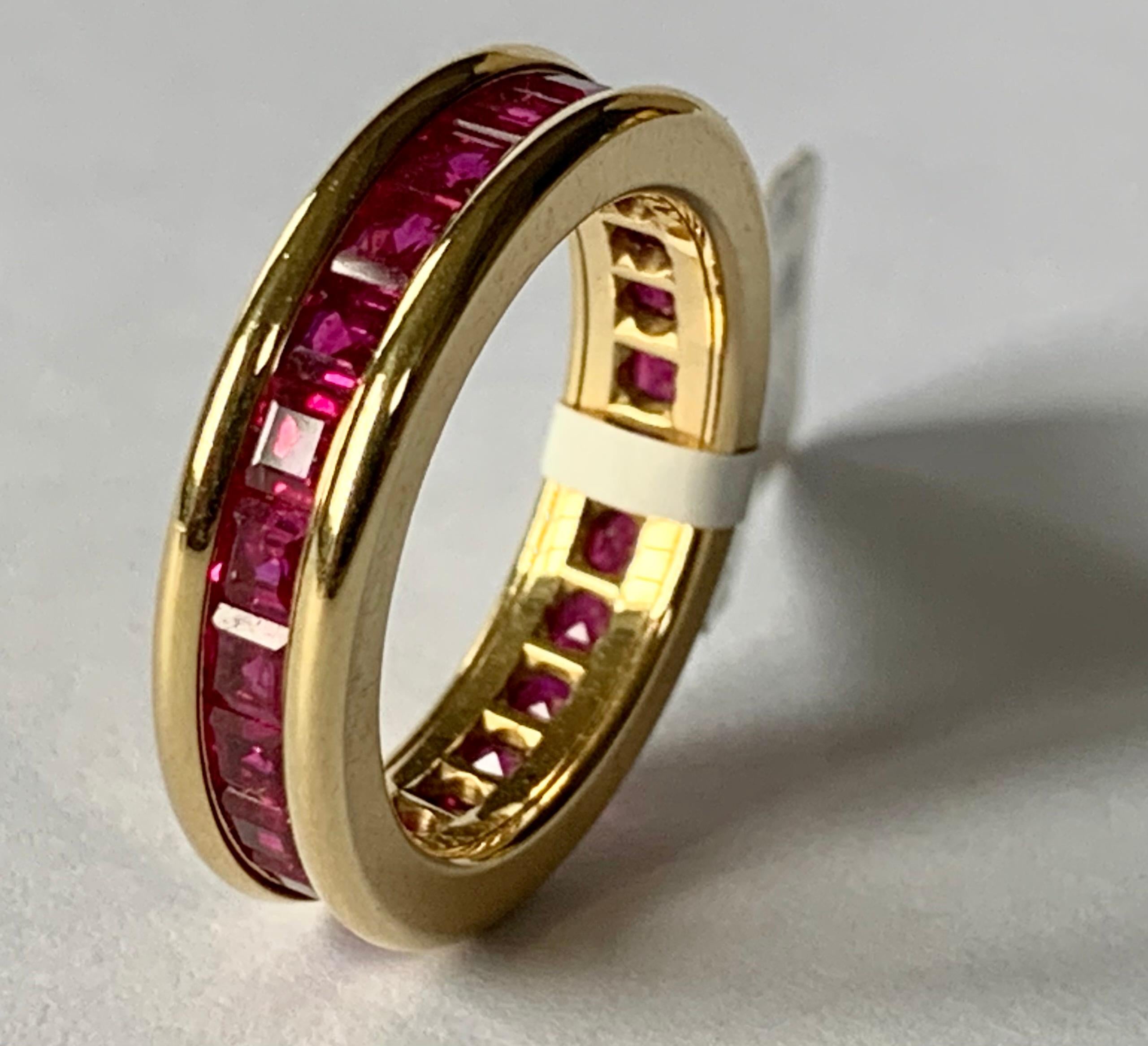 18 K yellow Gold Ruby eternity ring. The rubies weighting 3.39 ct are set in a solid channel setting. 
Ring fits a ring size 54/14and can only be resized to a smaller ring size. US size 7!
This is especially nice when worn together with another