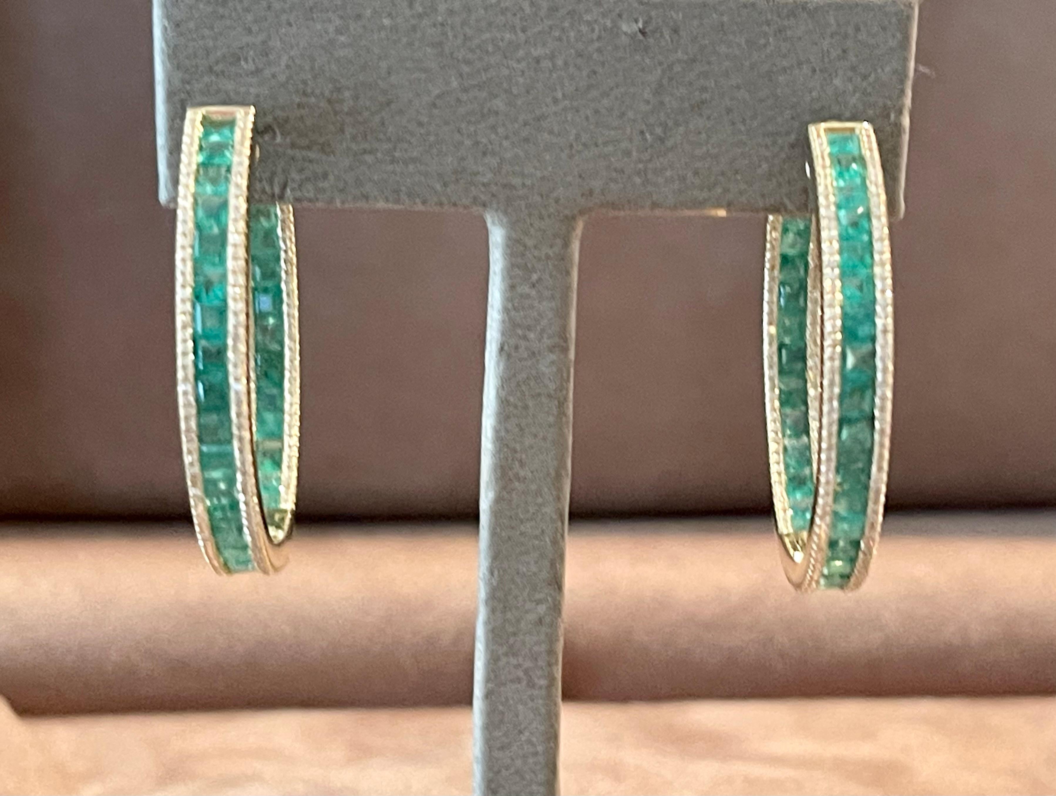 Contemporary 18 K yellow Gold inside out Emerald Diamond hoop earrings For Sale